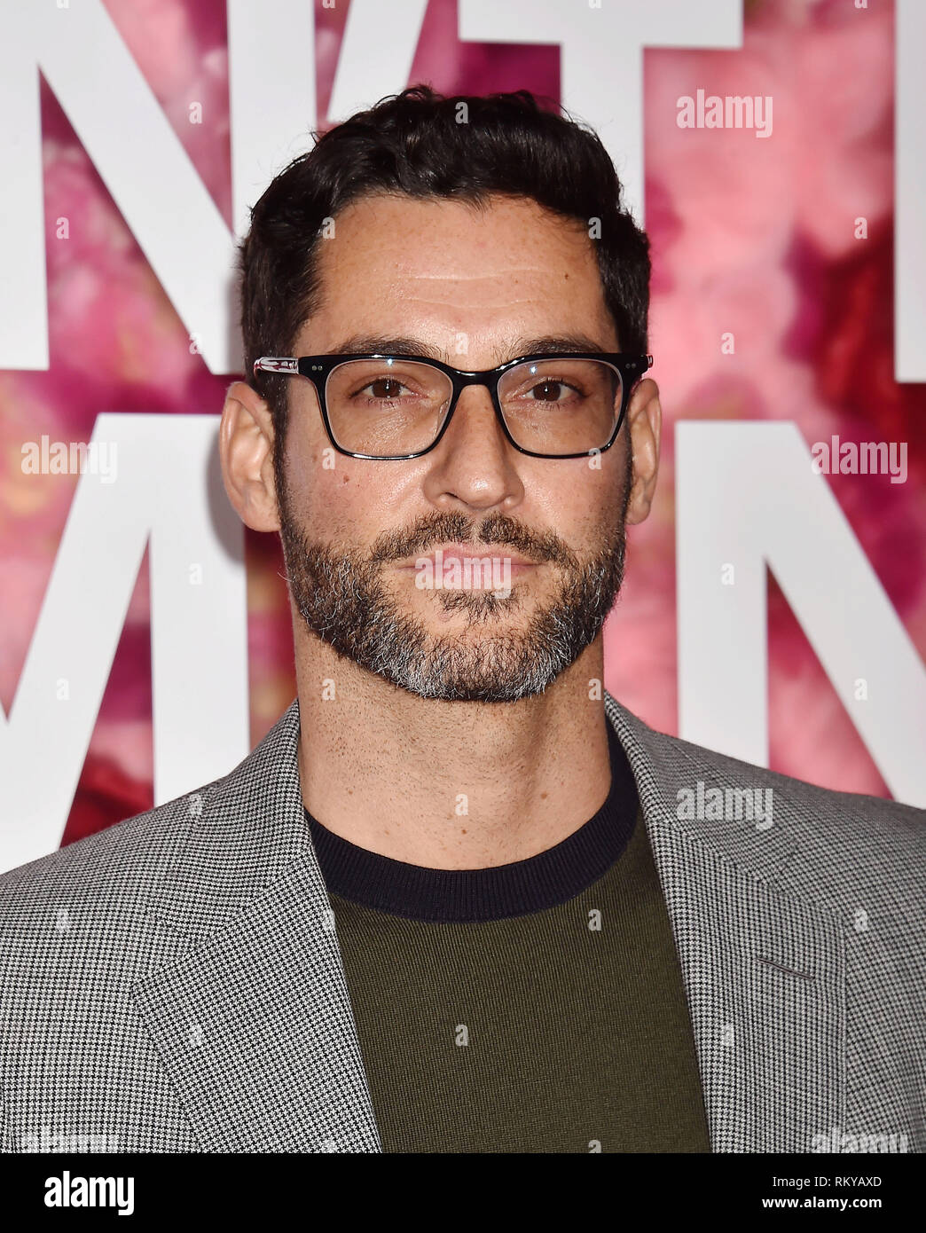 LOS ANGELES, CA - FEBRUARY 11: Tom Ellis arrives at the Premiere Of Warner Bros. Pictures' 'Isn't It Romantic' at The Theatre at Ace Hotel on February Stock Photo