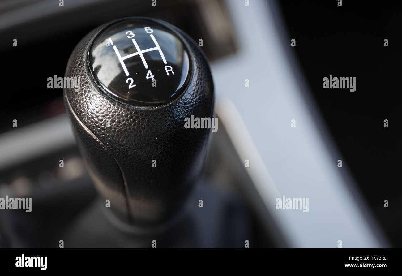 A 5 speed gear shift up close. Stock Photo