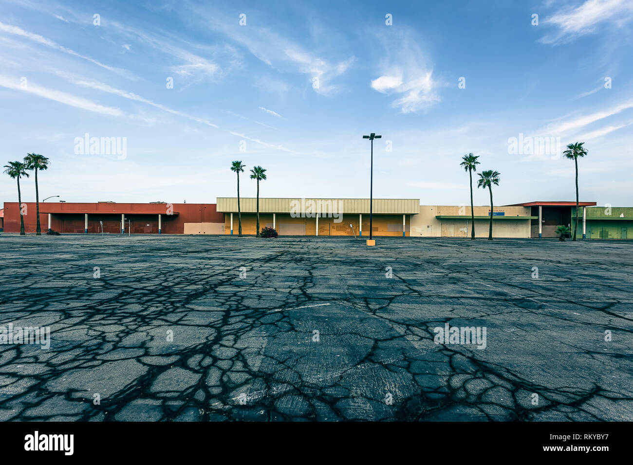 Vacant and boarded up shopping center in El Centro in California Stock