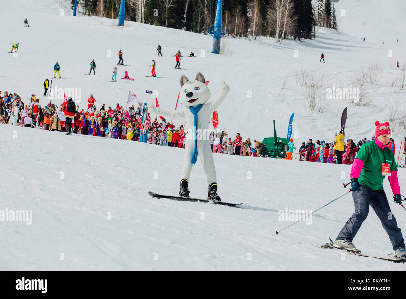 Sheregesh, Kemerovo region, Russia - April 7, 2018: Grelka Fest is a sports and entertainment activity for ski and snowboard riders in carnival costum Stock Photo