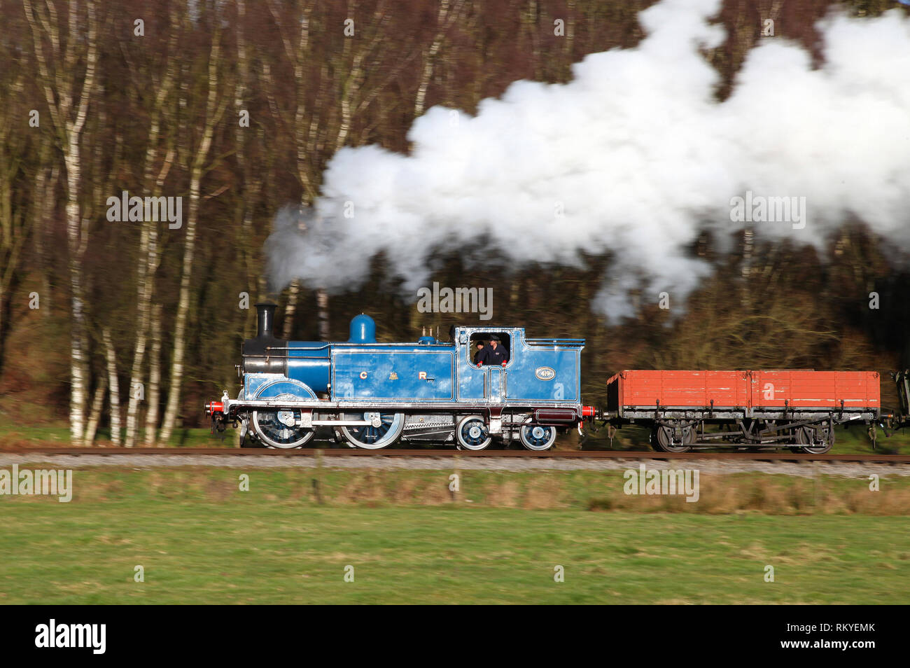 Caley tank 419 heads past Consall wood on 10.2.19 on the Churnet Valley railway. Stock Photo
