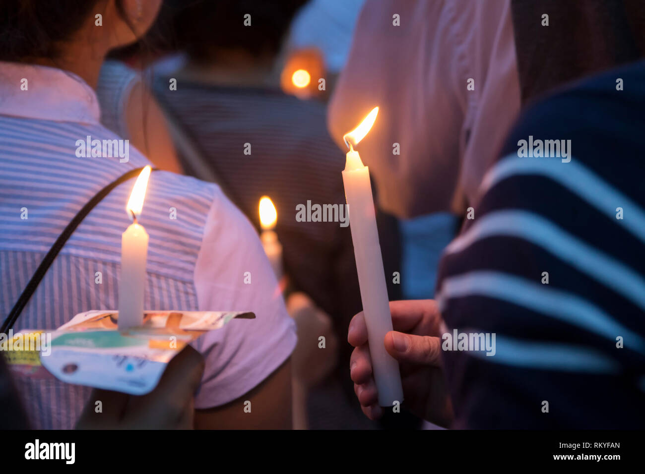 People with candles in their hands.  On July 6, 2018, a candlelight vigil was held in 25 cities of Colombia and the world as a form of protest for the Stock Photo