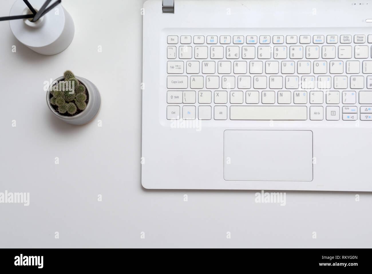 Laptop computer on modern office desk with blank screen Stock Photo - Alamy