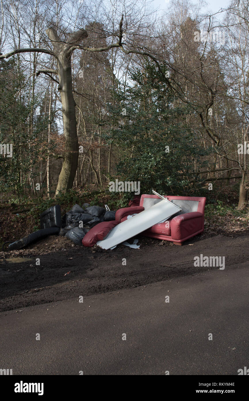 Fly-tipping of household waste and furniture, Iver Heath near Slough. Stock Photo