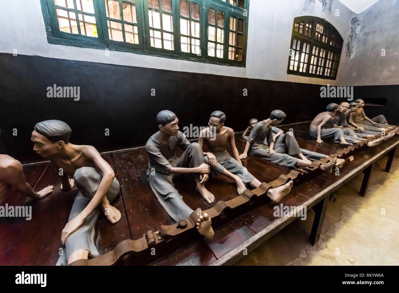 A large room where Vietnamese prisoners were kept shackled by the French, who had built the prison and called it the Maison Centrale. It was used as Stock Photo