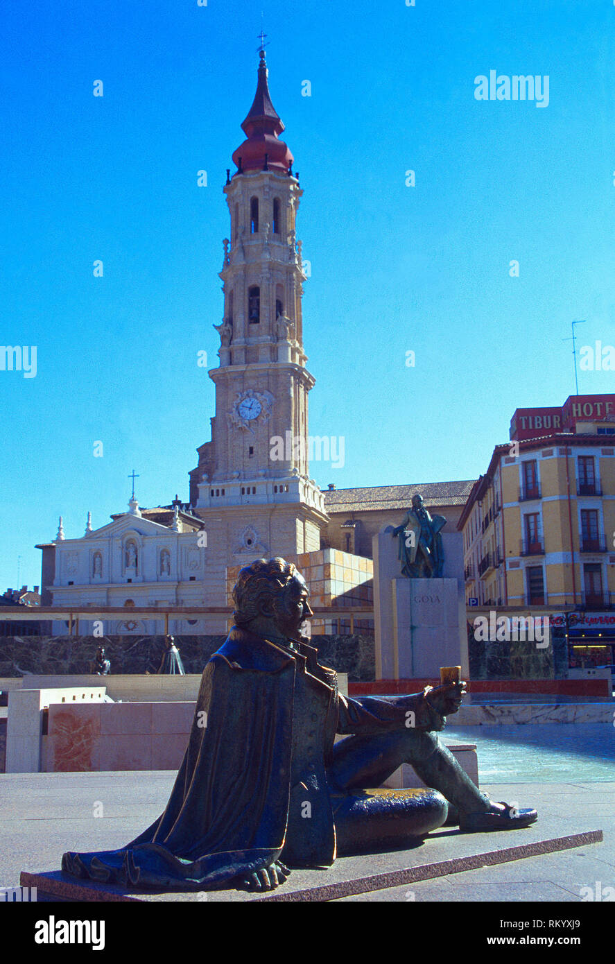 Tower of La Seo and Goya monument. Plaza del Pilar, Zaragoza, Spain. Stock Photo