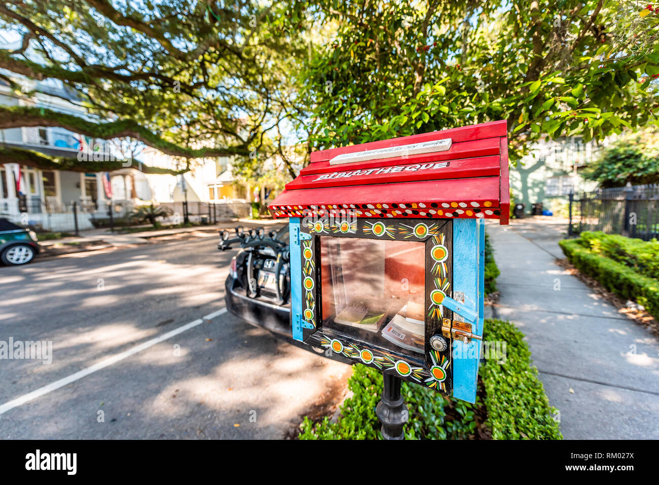 New Orleans, USA - April 23, 2018: Mini little free library bibliotheque in  uptown garden district with books by sidewalk wide angle and nobody Stock  Photo - Alamy
