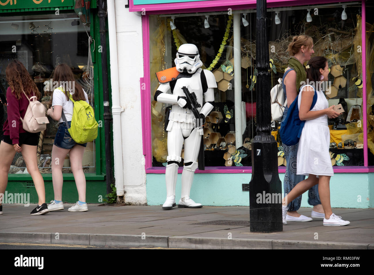 Glastonbury resident dressed as a Stormtrooper from Star Wars in the Market Place Stock Photo