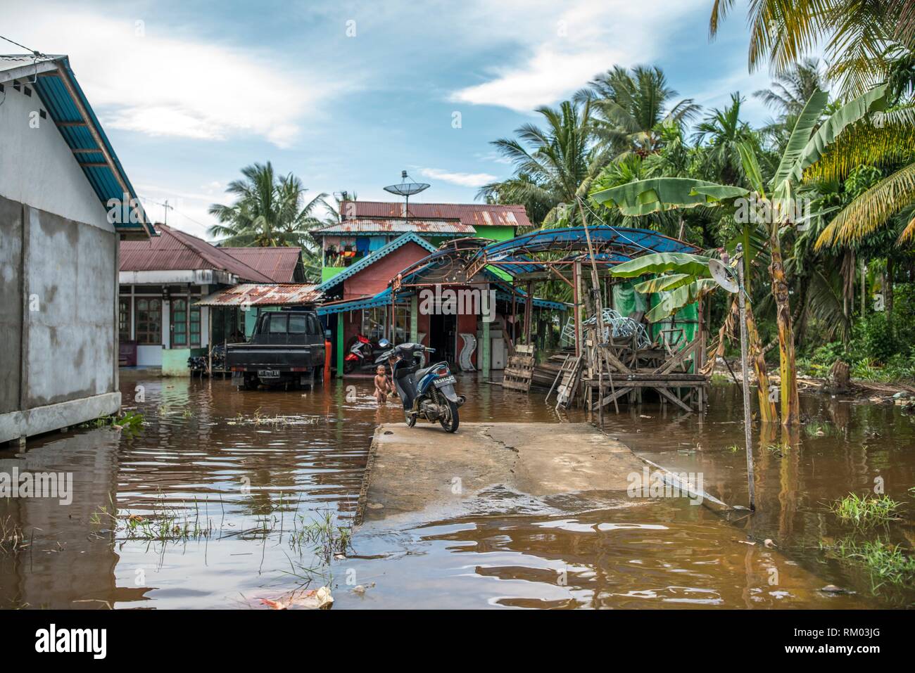 King tide in Kampung Sei Kakap, Pontianak, West Kalimantan, Indonesia Stock Photo