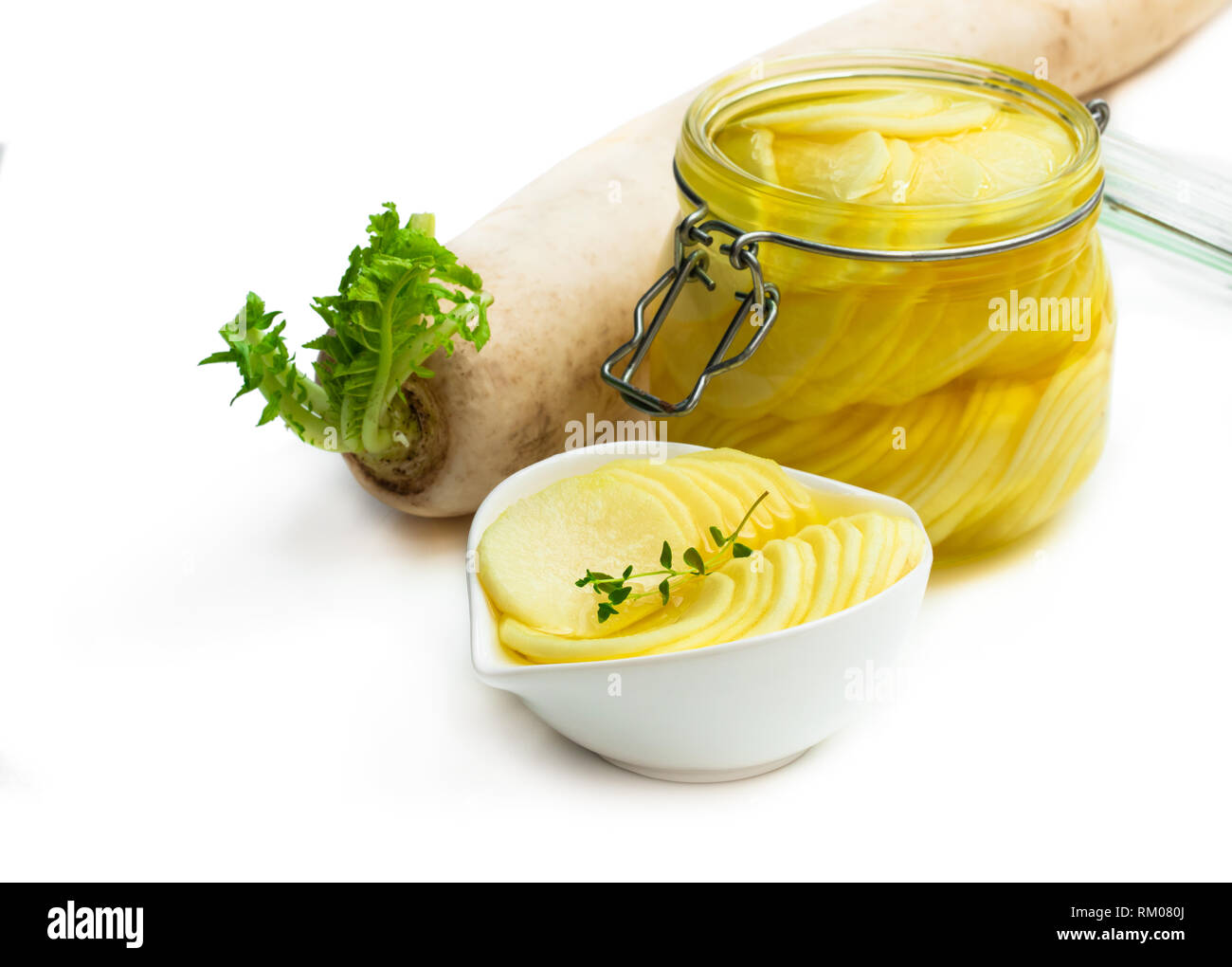 Marinated daikon isolated on white Stock Photo Alamy