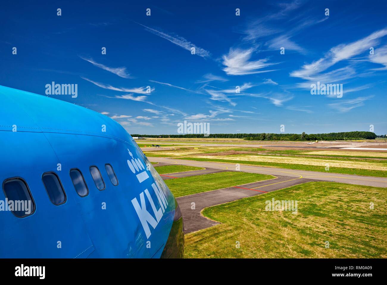 The front of a KLM Boeing 747-206 Jumbo Jet Combi at the Aviodrome National Air Museum, overlooking the taxiways and runway at Lelystad Airport, Stock Photo