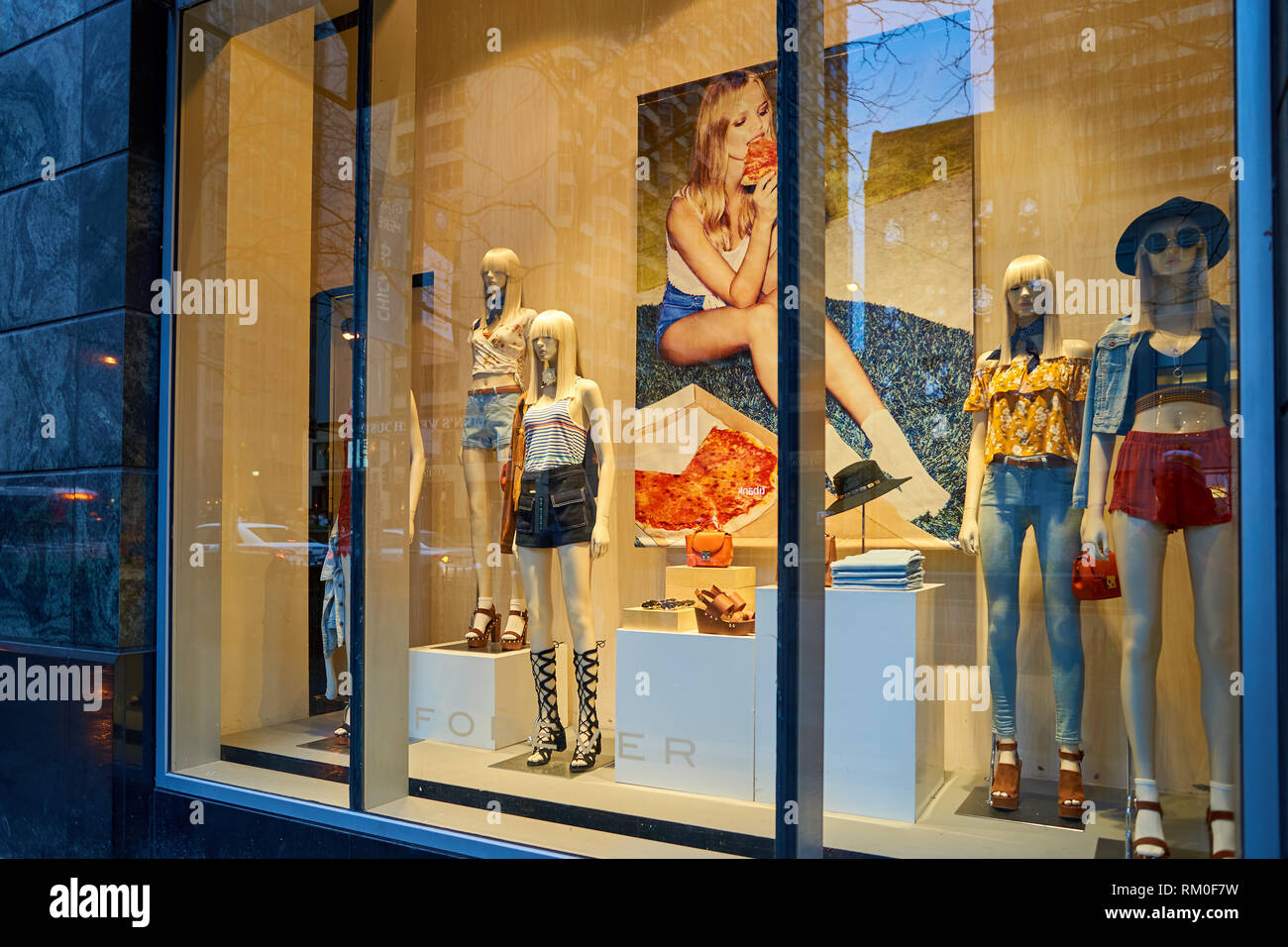 CHICAGO, IL - APRIL 01, 2016: shop window at Forever 21 store. Forever 21 is an American chain of fast fashion retailers with its headquarters in Los  Stock Photo