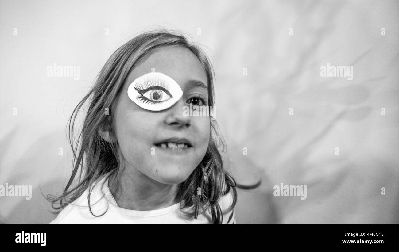 Girl with eye patch. Valencia, Spain Stock Photo