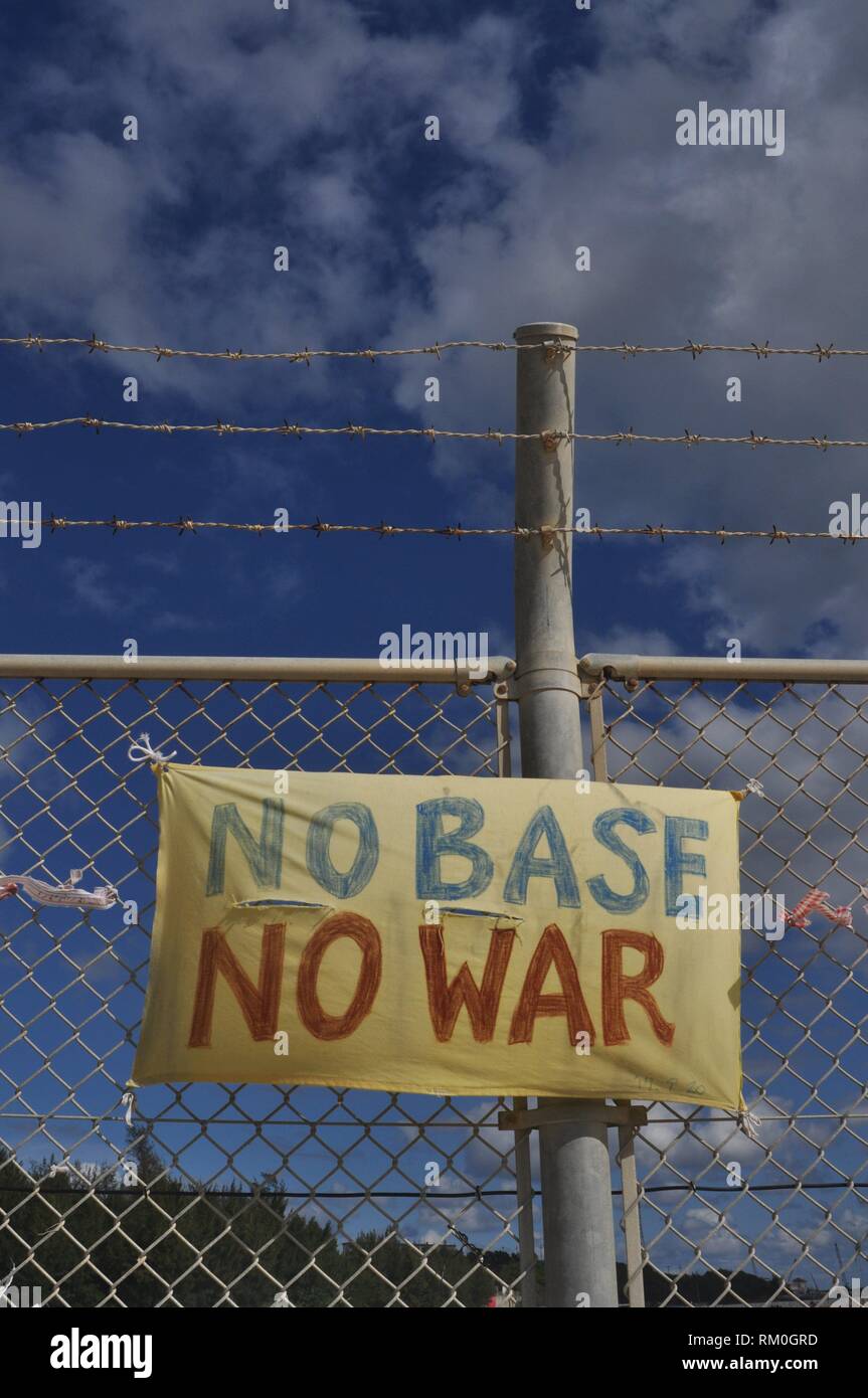 Henoko Bay, Okinawa, Japan: sign against the American Marines military base of Camp Schwab Stock Photo