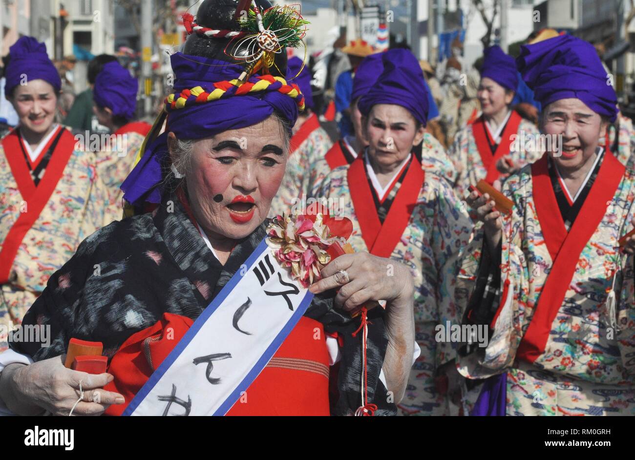 Itoman, Okinawa, Japan: aged ladies folkloric group during the O-tsunahiki Festival Stock Photo