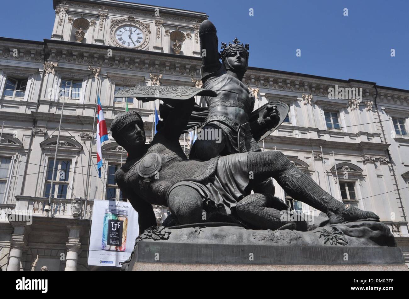 Turin, Italy: monument to Amedeo VI di Savoia, the ´Green Count´, winning against the Turks, facing Palazzo Civico (City Hall) Stock Photo