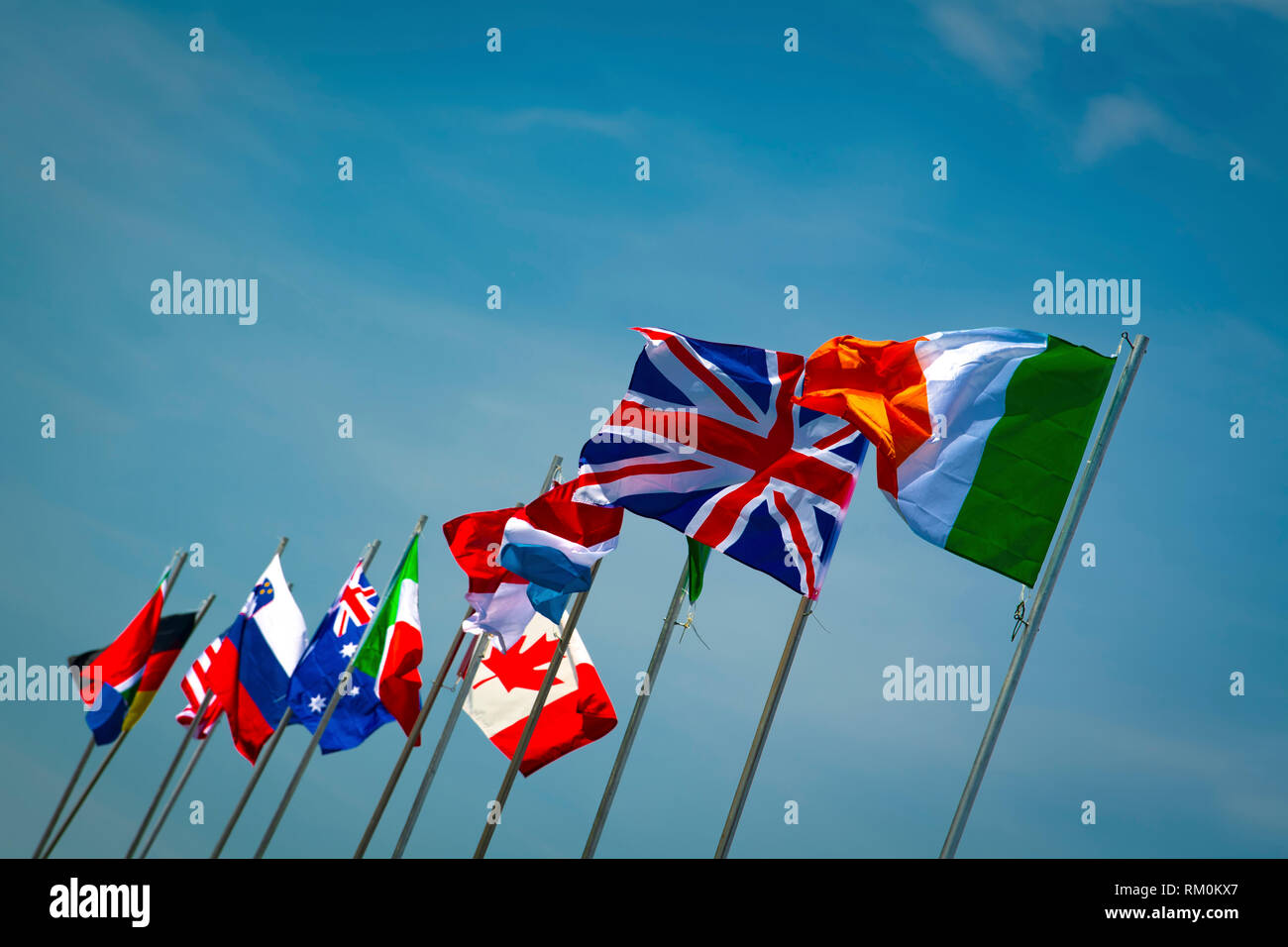 Flags of the world blowing in the wind. Stock Photo