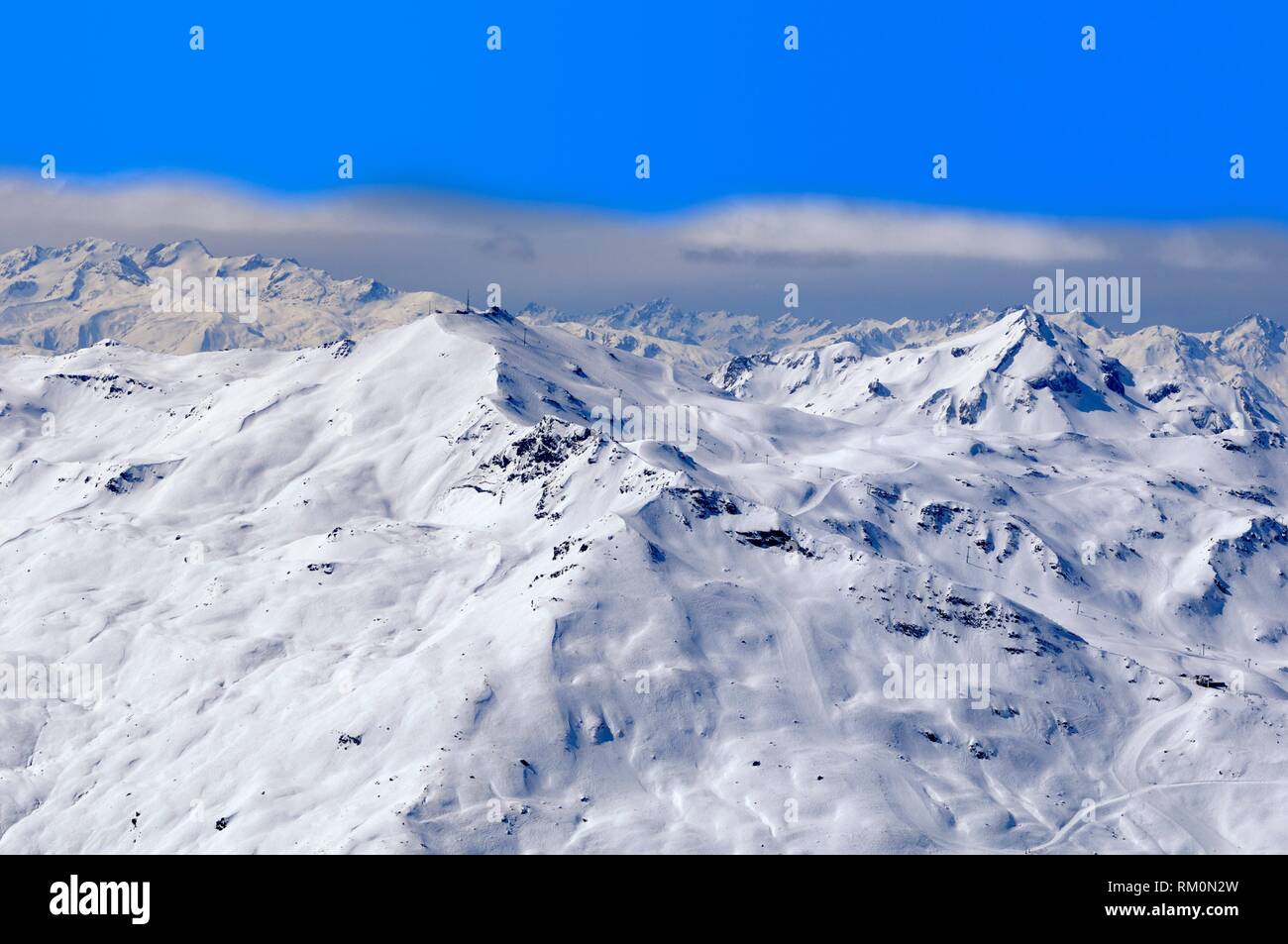 La Masse 2804m, Mountain Range, low Clouds, Snow Scenery, Haute Savoie, Trois Vallees, Three Valleys, Ski Resort, France, Europe Stock Photo
