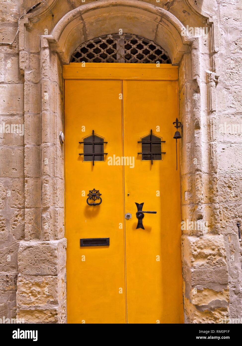 Yellow door in Senglea. Malta Stock Photo