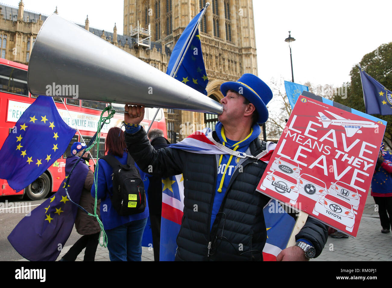 Steven Bray founder of SODEM (Stand of Defiance European Movement) seen with placards during an anti-Brexit protest outside Downing Street in London. Stock Photo