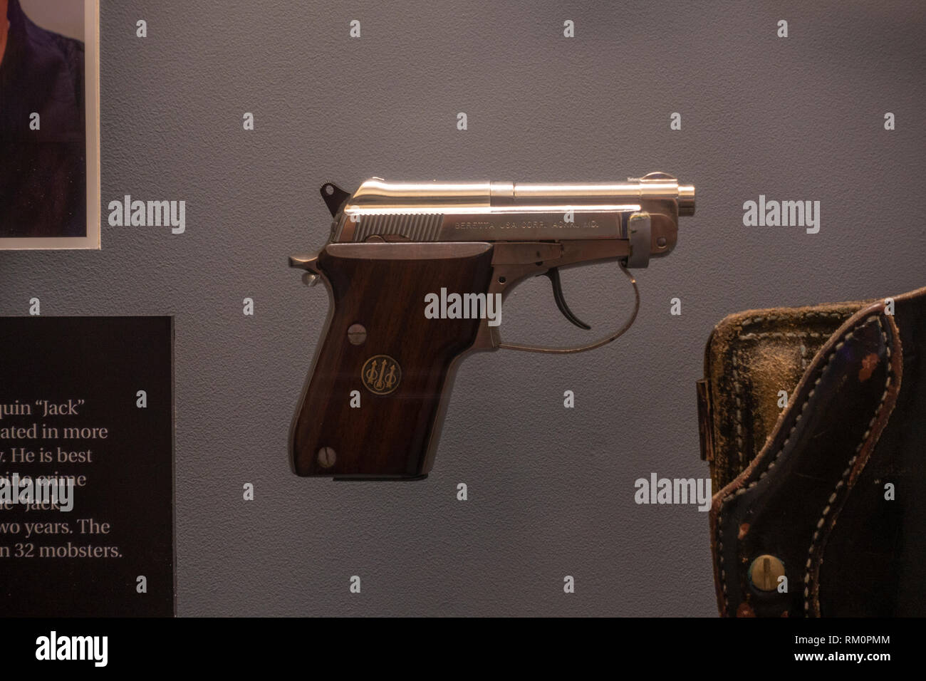 A nine-shot .25 caliber Beretta small gun, as used by an undercover Police Officer, The Mob Museum, Las Vegas, Nevada, United States. Stock Photo