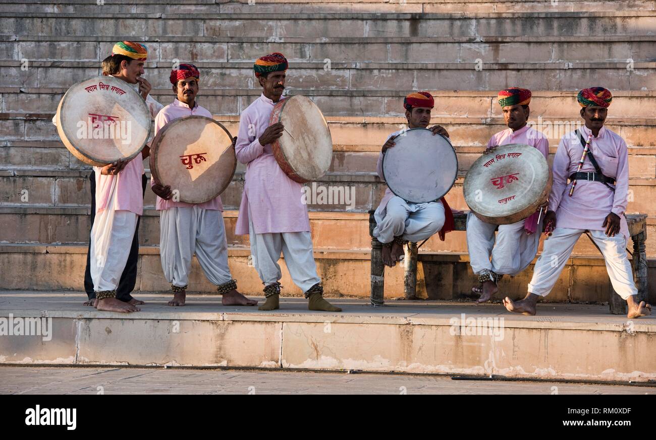 Traditional Rajasthani drummers on the ghats, Pushkar, Rajasthan, India