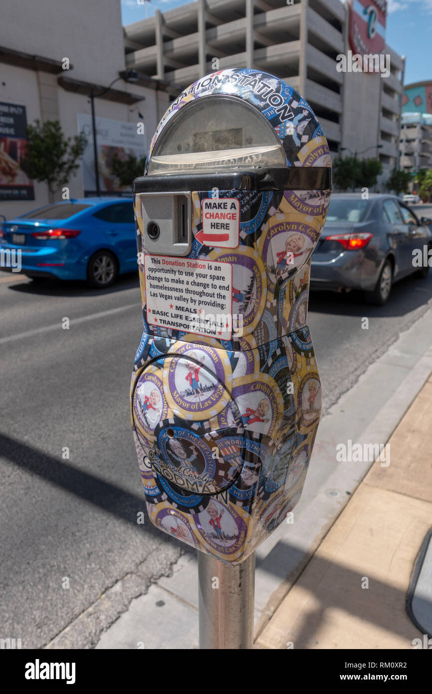 A parking meter converted into a homelessness charity donation box in