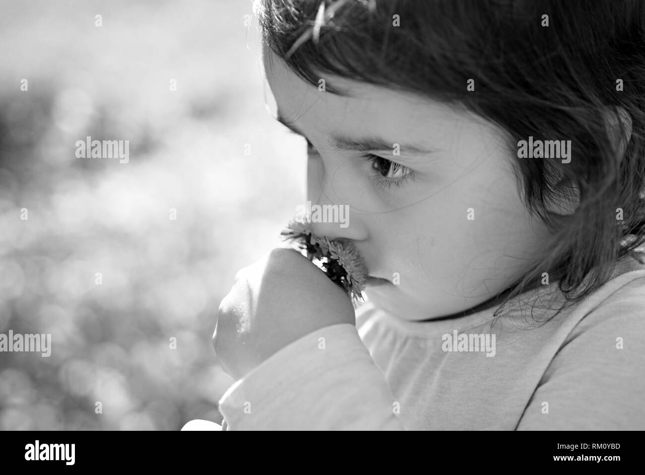 Enjoying every moment. Springtime. weather forecast. Little girl in sunny spring. face skincare. allergy to flowers. Summer girl fashion. Happy Stock Photo