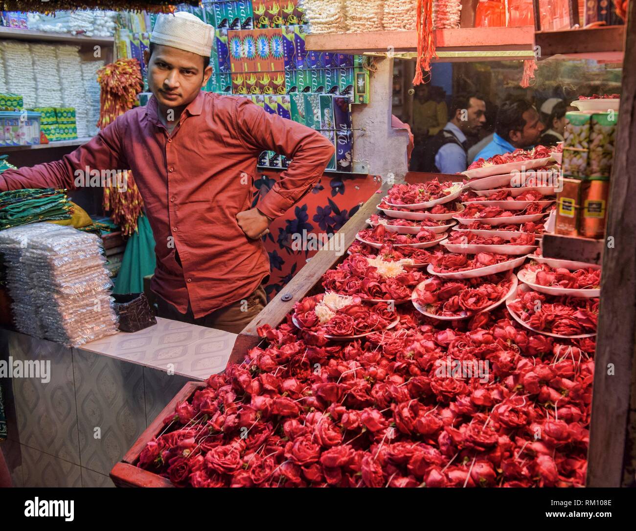 Flower seller at Nizamuddin Dargah, the Sufi saints mausoleum, Old