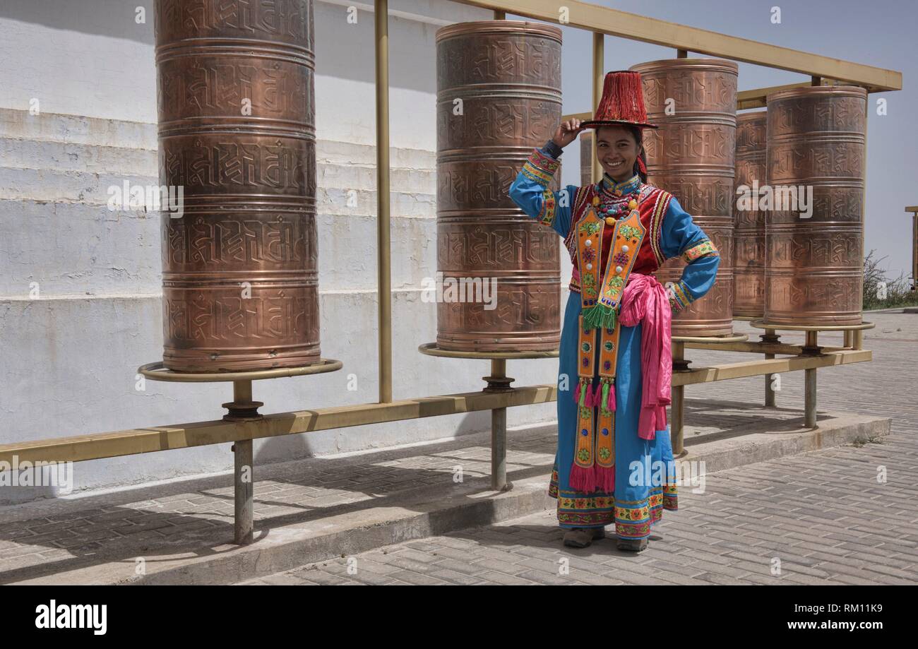 Traditional dress of the Yugur ethnic minority, Mati Si, Gansu, China. Stock Photo