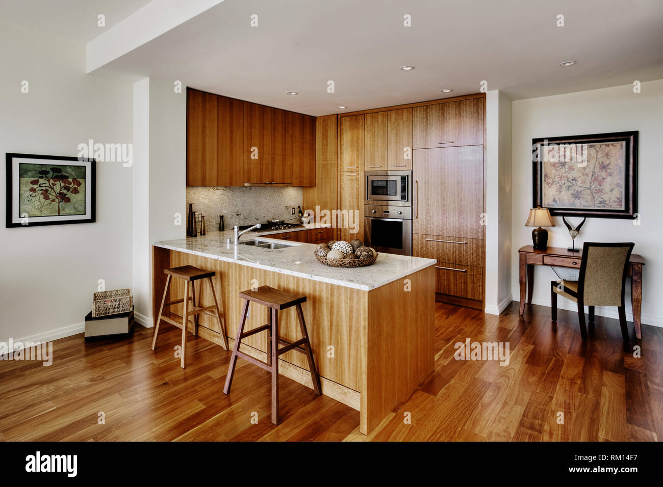 Wood cupboards in modern kitchen Stock Photo - Alamy