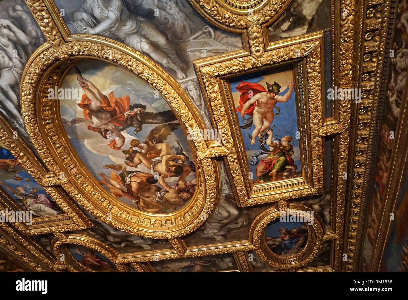 Ceiling of the Sala del Consiglio del Dieci. On the left we can see Paolo Veronese's ''Giove che fulmine i vizi'' and on the right Giambattista Stock Photo