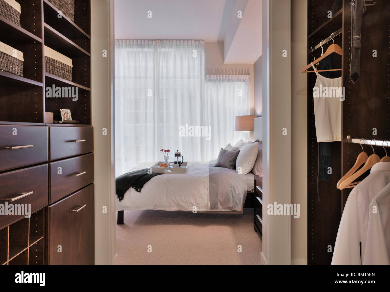 Walk In Closet In Luxury Master Bedroom Stock Photo
