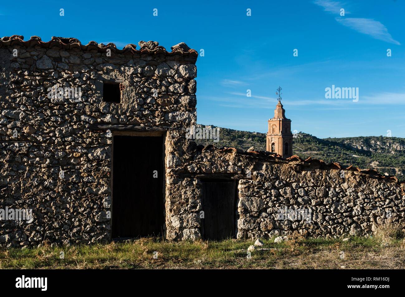 Built structures and church tower, Xiva de Morella, Castellón, Spain Stock Photo