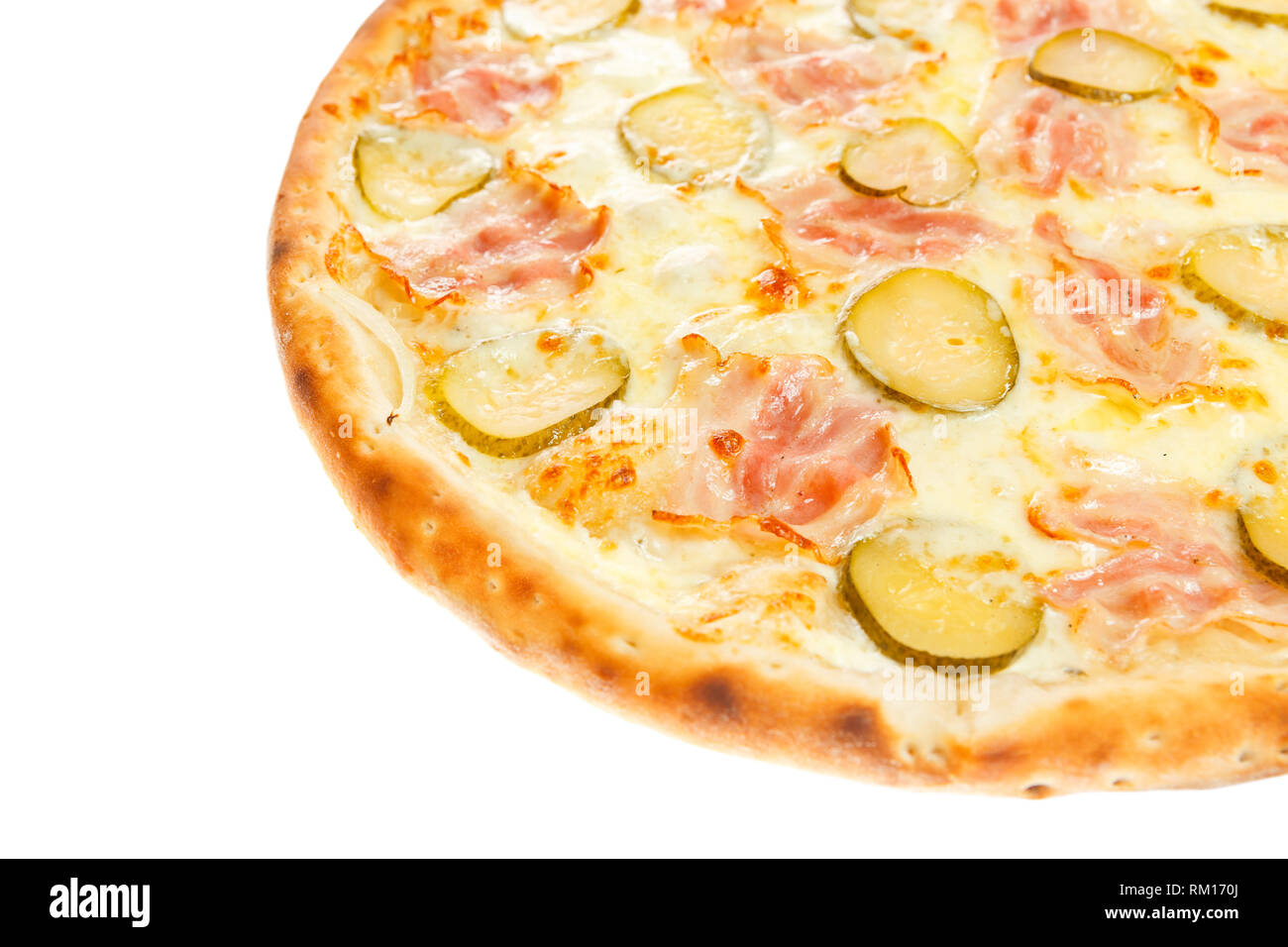 Part of delicious classic italian pizza with ham, cucumbers and cheese