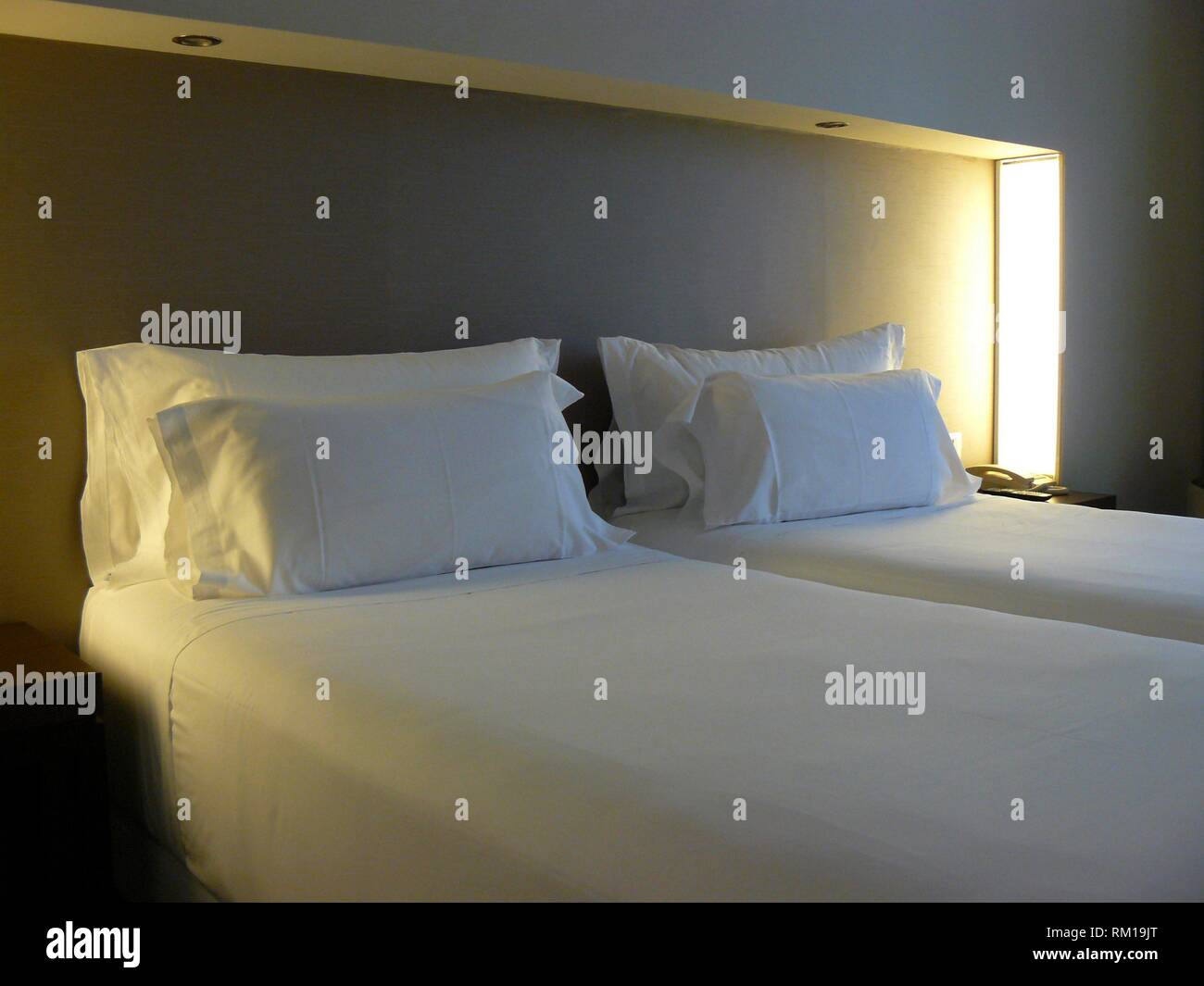 Double bed in a hotel room Stock Photo Alamy