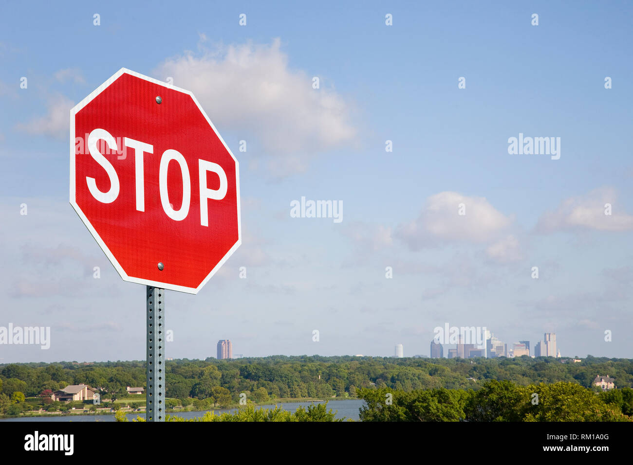 Stop Sign With City Skyline Stock Photo
