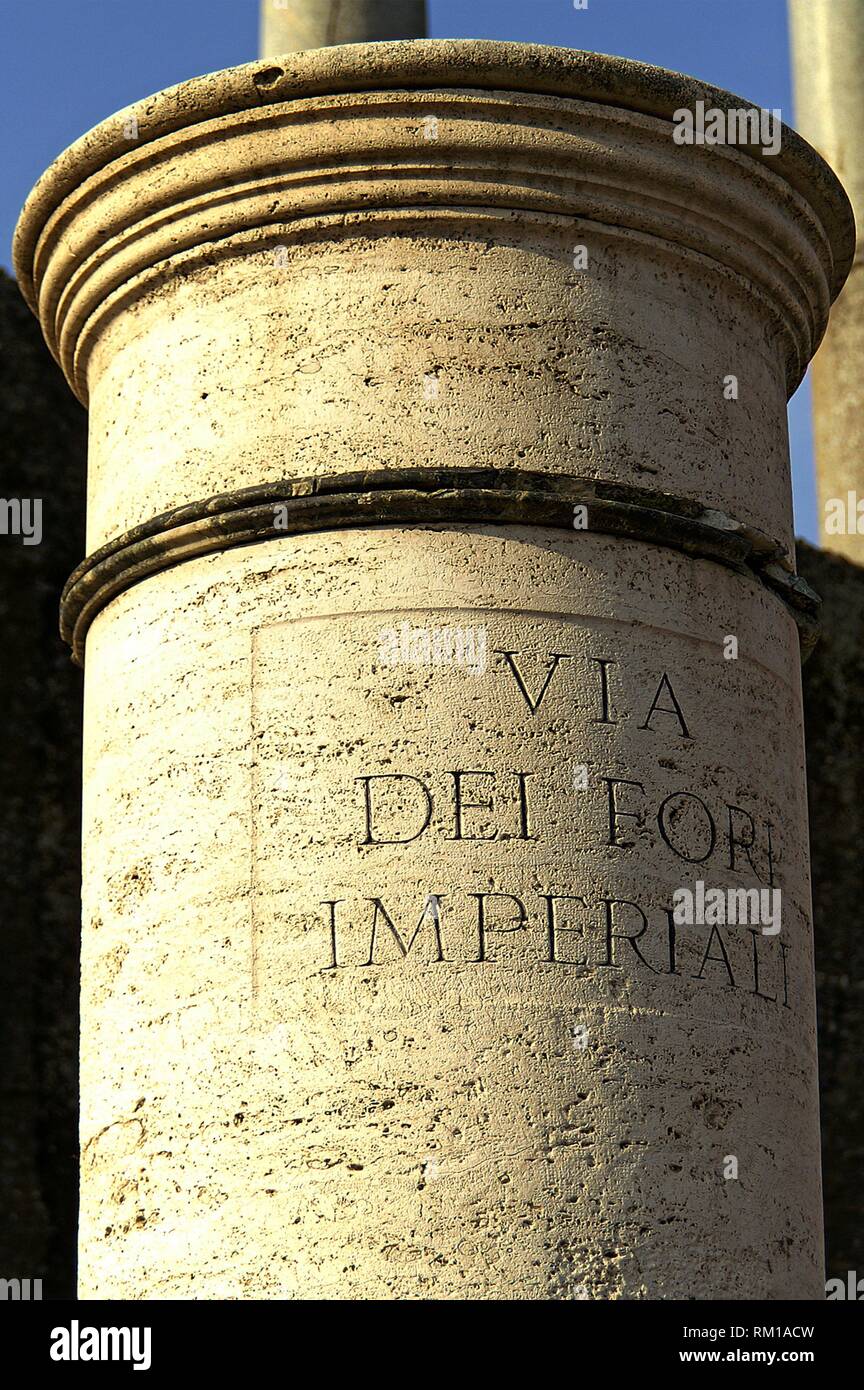 Roma (Italia). Column with an inscription on the Via Dei Fori Imperiali Rome City. Stock Photo