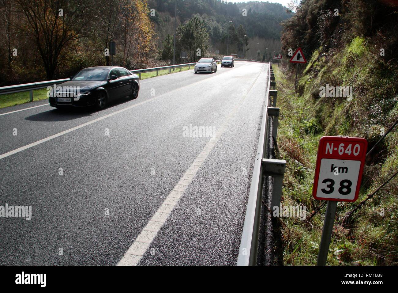 Dangerous sections of the Spanish road network. Dangerous road in the National 640, on its way through A Pontenova, Lugo Parallel to the Eo River. Stock Photo