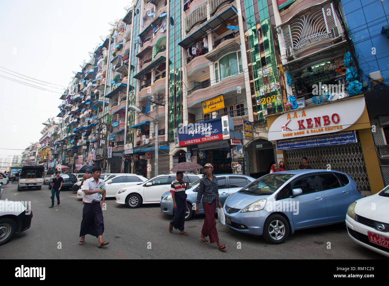 Daily life in Bo Soon Pat street, Sule Pagoda area, city center, Yangon, Myanmar, Asia Stock Photo
