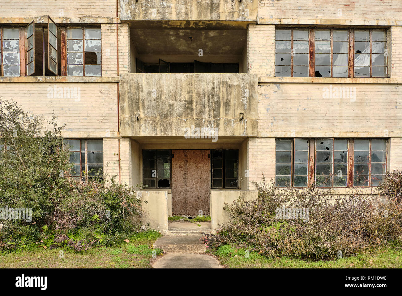 Abandoned, broken down, dilapidated, vacant, empty HUD government housing building that has turned into urban blight in Montgomery Alabama, USA. Stock Photo