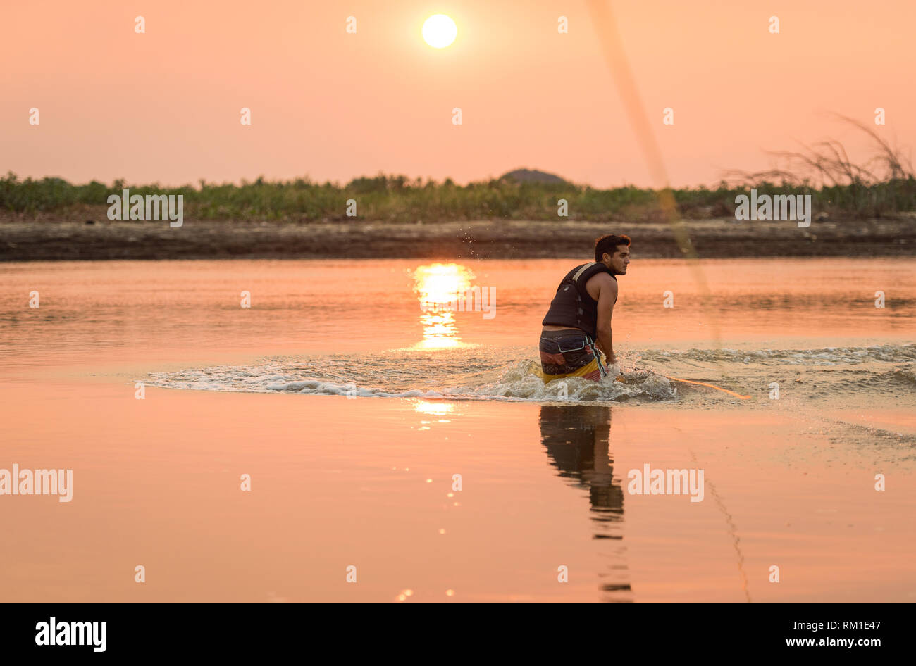 Sunset wakeboarding Stock Photo