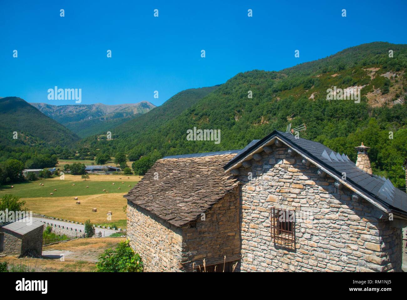 House and landscape of Broto valley. Oto, Huesca province, Aragon, Spain. Stock Photo
