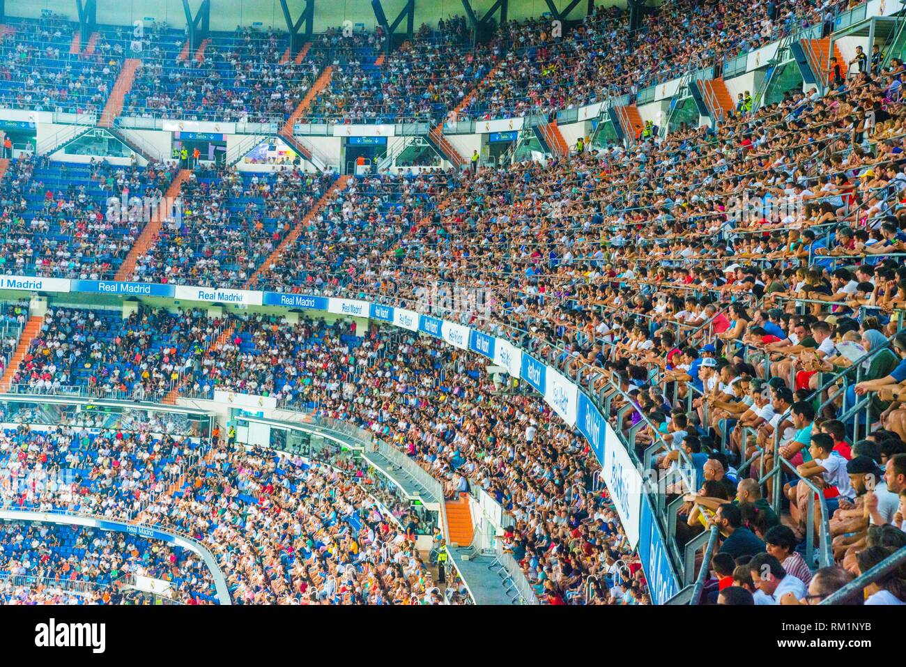 Spectators at the grandstands. Santiago Bernabeu stadium, Madrid, Spain. Stock Photo