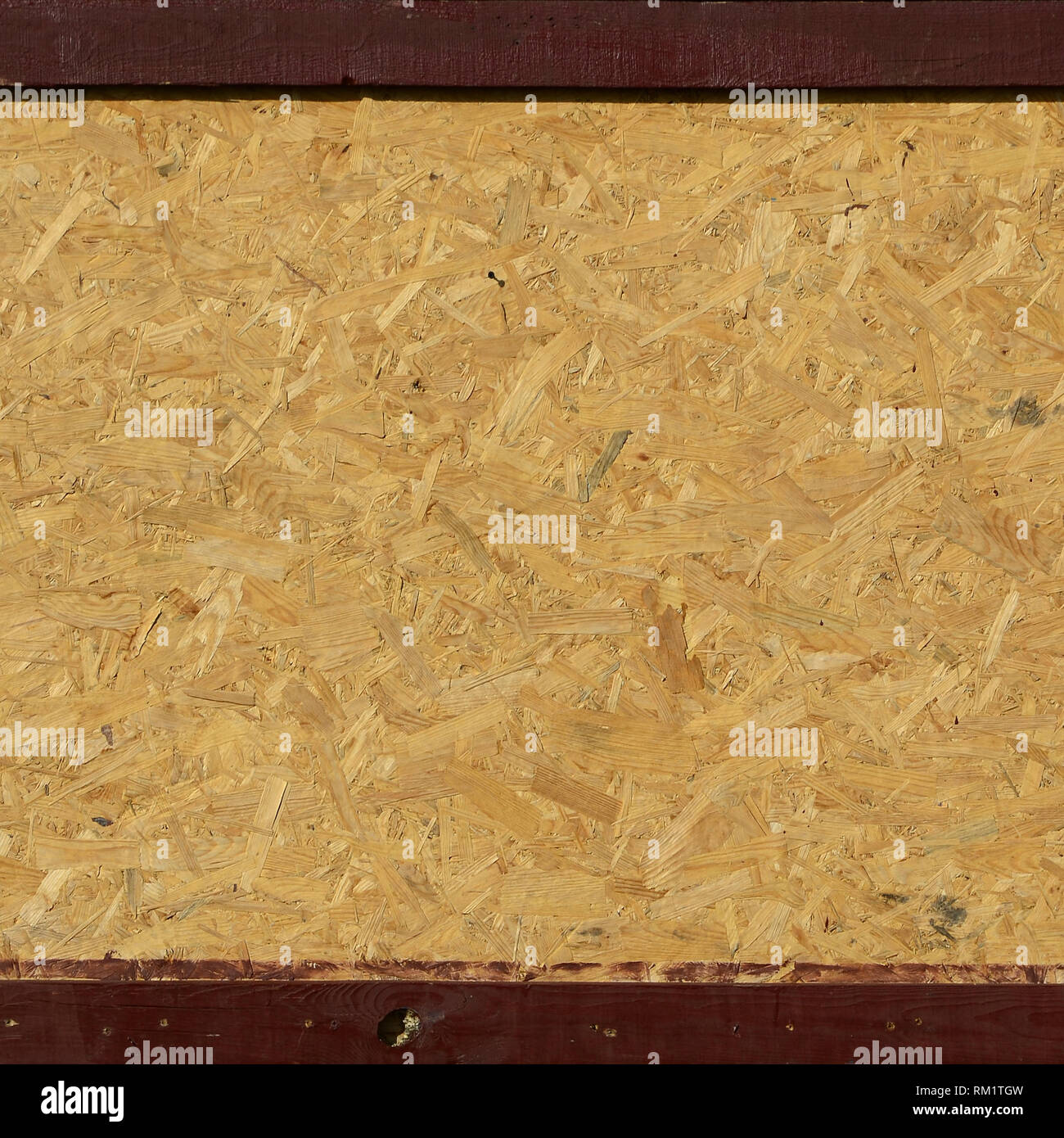 OSB boards are made of brown wood chips sanded into a wooden background. Top  view of OSB wood veneer background, tight, seamless surfaces Stock Photo -  Alamy