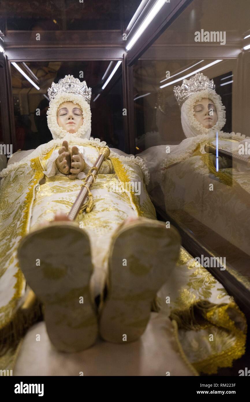 Sculpture of the Virgin of the Assumption in a glass coffin in the Casa