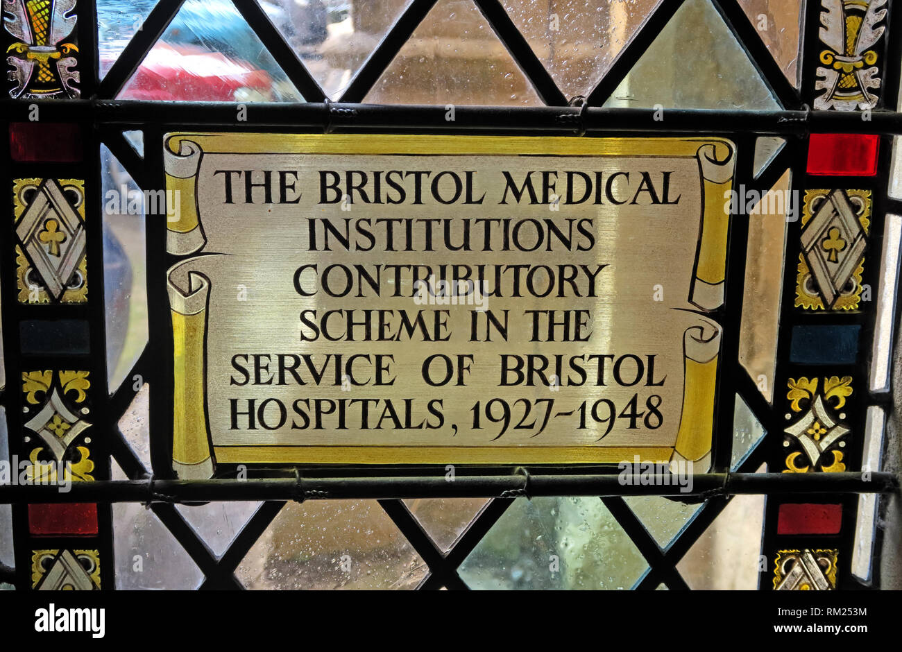 Stained Glass inscription, Bristol cathedral, Cathedral Church of the Holy and Undivided Trinity , College Green, Bristol, BS1 5TJ Stock Photo