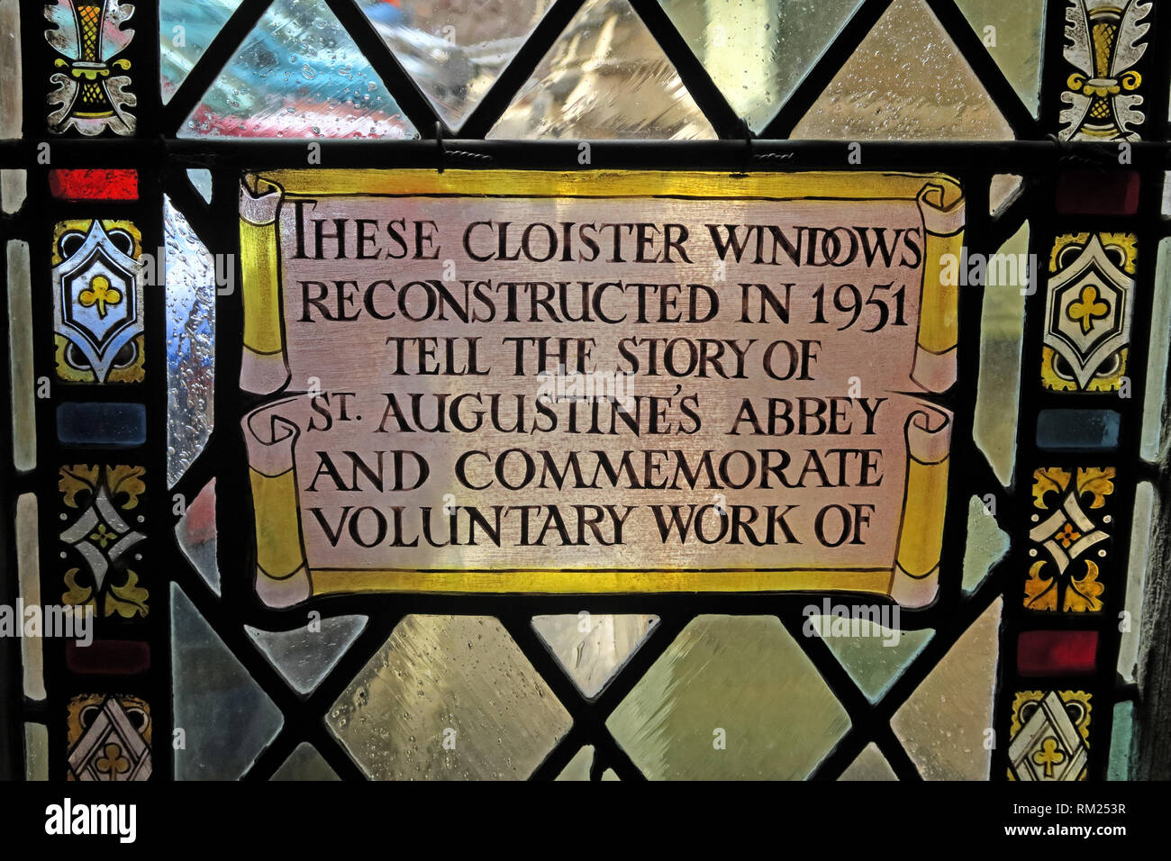 1951 St Augustines Abbey, Stained Glass inscription, Cathedral Church of the Holy and Undivided Trinity , College Green, Bristol, BS1 5TJ Stock Photo