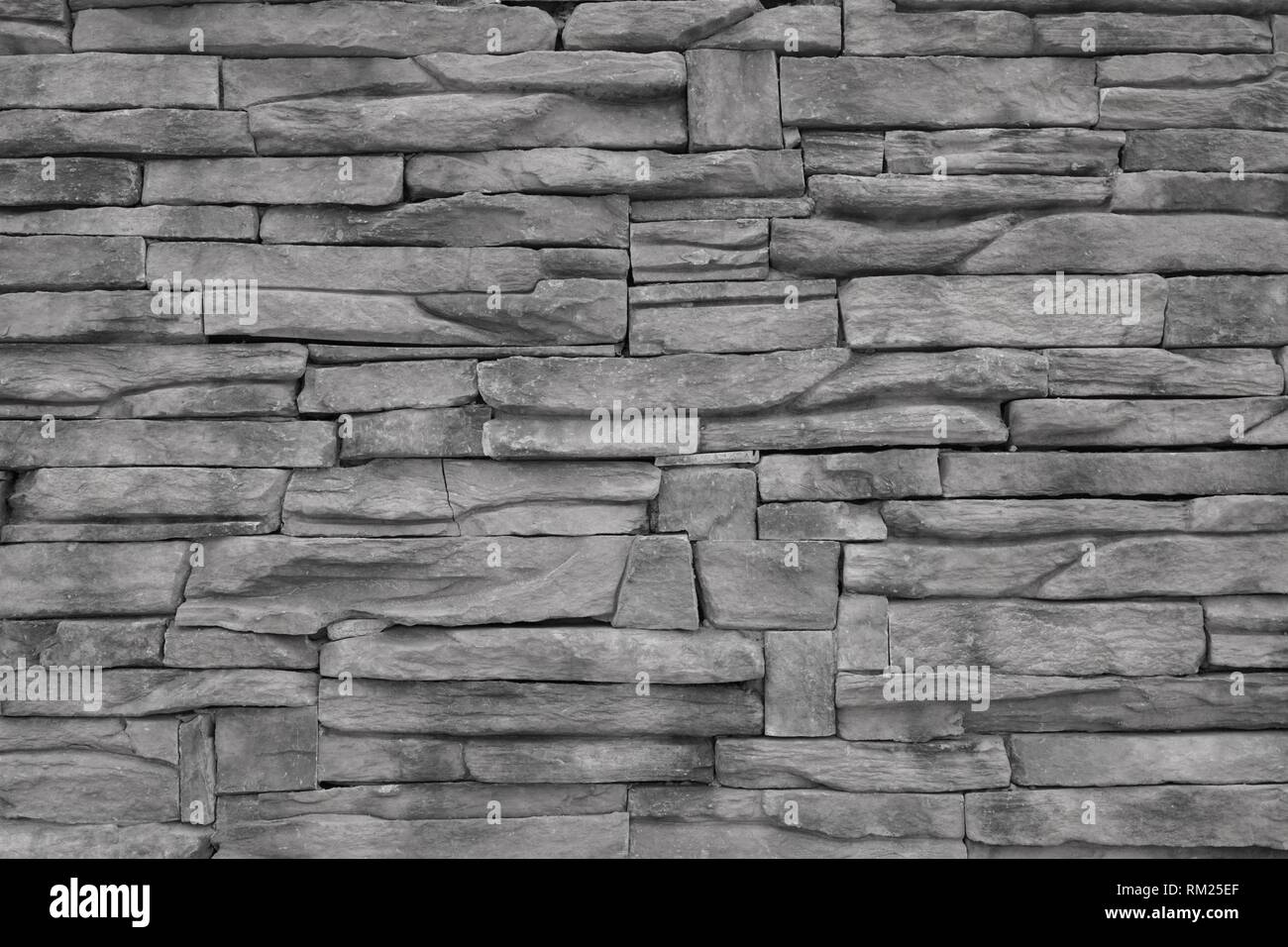 Black and white stone wall for background or texture Stock Photo