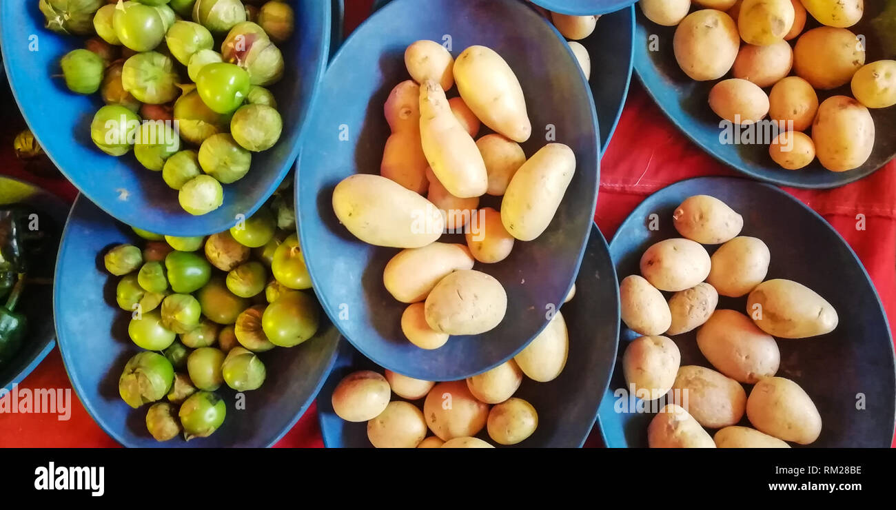 top view of potato and green tomatoes Stock Photo